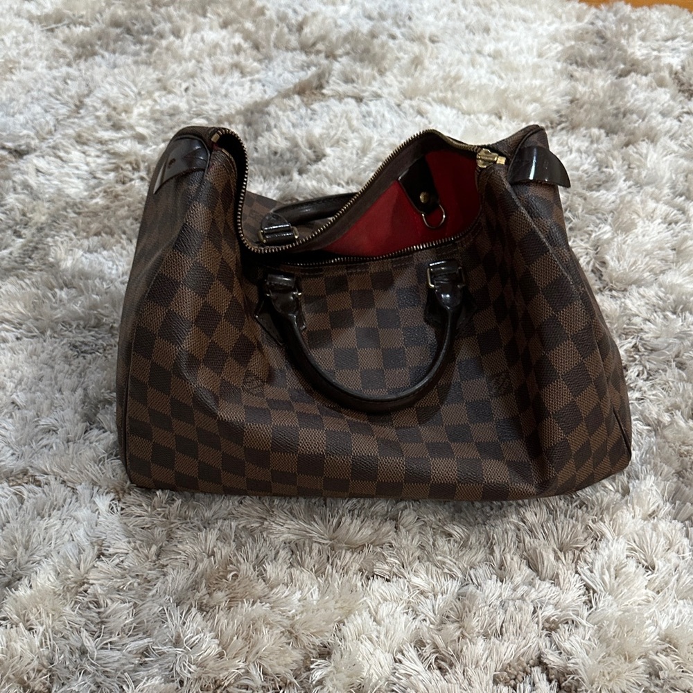 Louis Vuitton
Damier Ebene Speedy 35